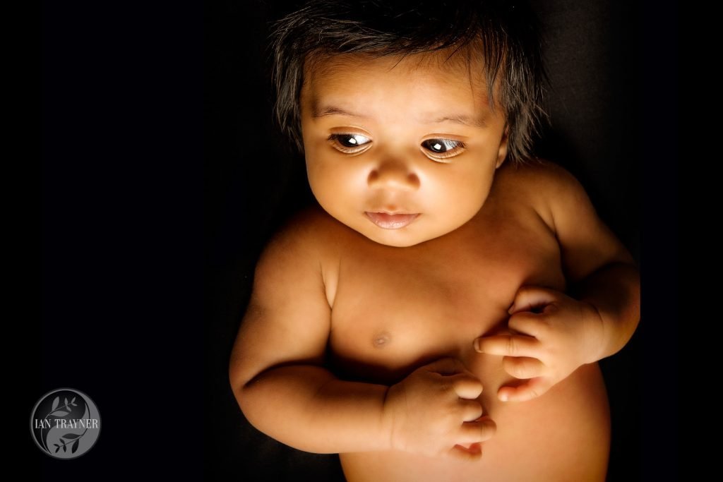 Cute baby with magical lighting.