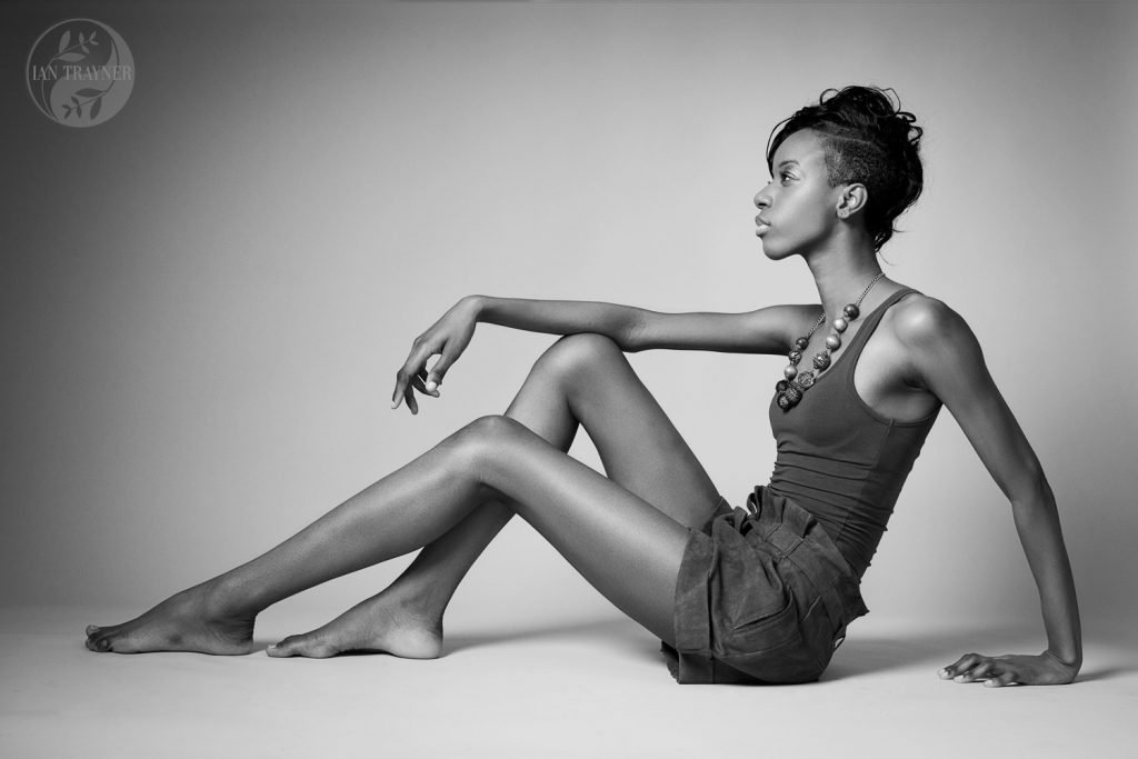 Simple and elegant monochrome photo of a slim black model. This image was taken on a model experience photo shoot.