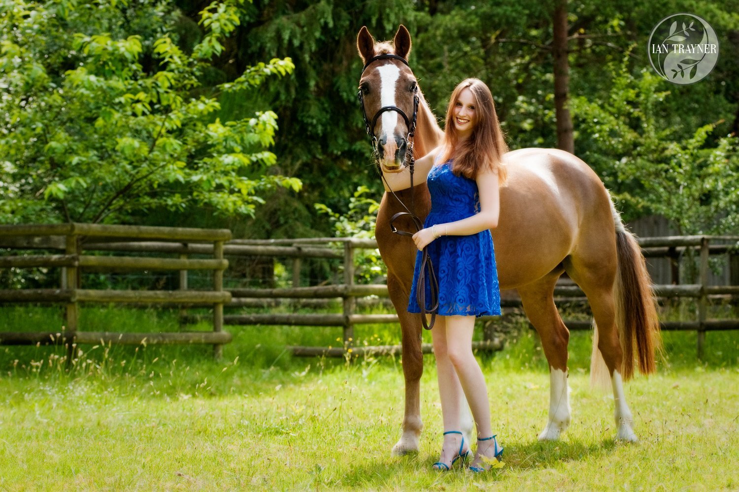Glamorous photo of beautiful young woman with her horse. Equine photography by Ian Trayner