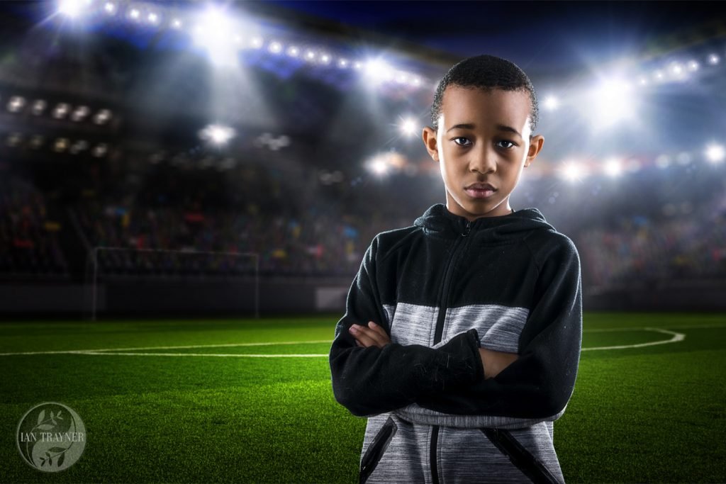 "Boy in football stadium", composite photographic artwork by Ian Trayner