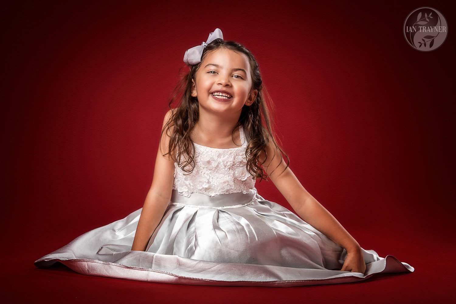Very cute girl photographed in the studio. Family photography by Ian Trayner