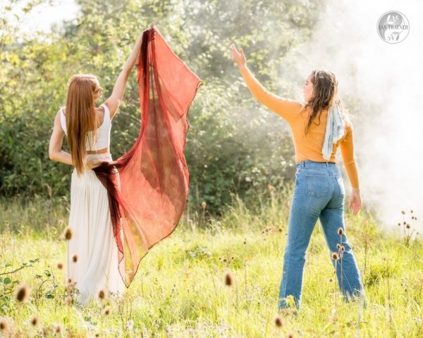 In a realm of sun and mist, Megan dances with her friend Nicole.