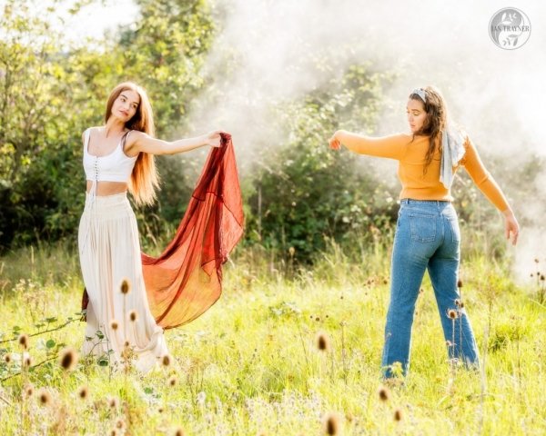 In a realm of sun and mist, Megan dances with her friend Nicole.