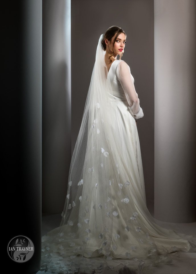 Bridal gown "Monroe" worn by Erika Sviderskyte. From Shamali's 2021 collection "Divine". Photo by Ian Trayne . Hollywood lighting.